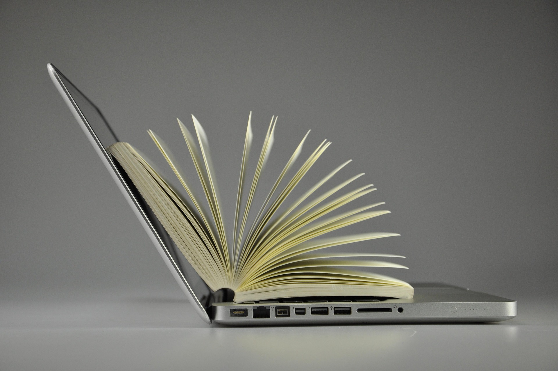 Laptop and Book, by SCY (Pixabay)